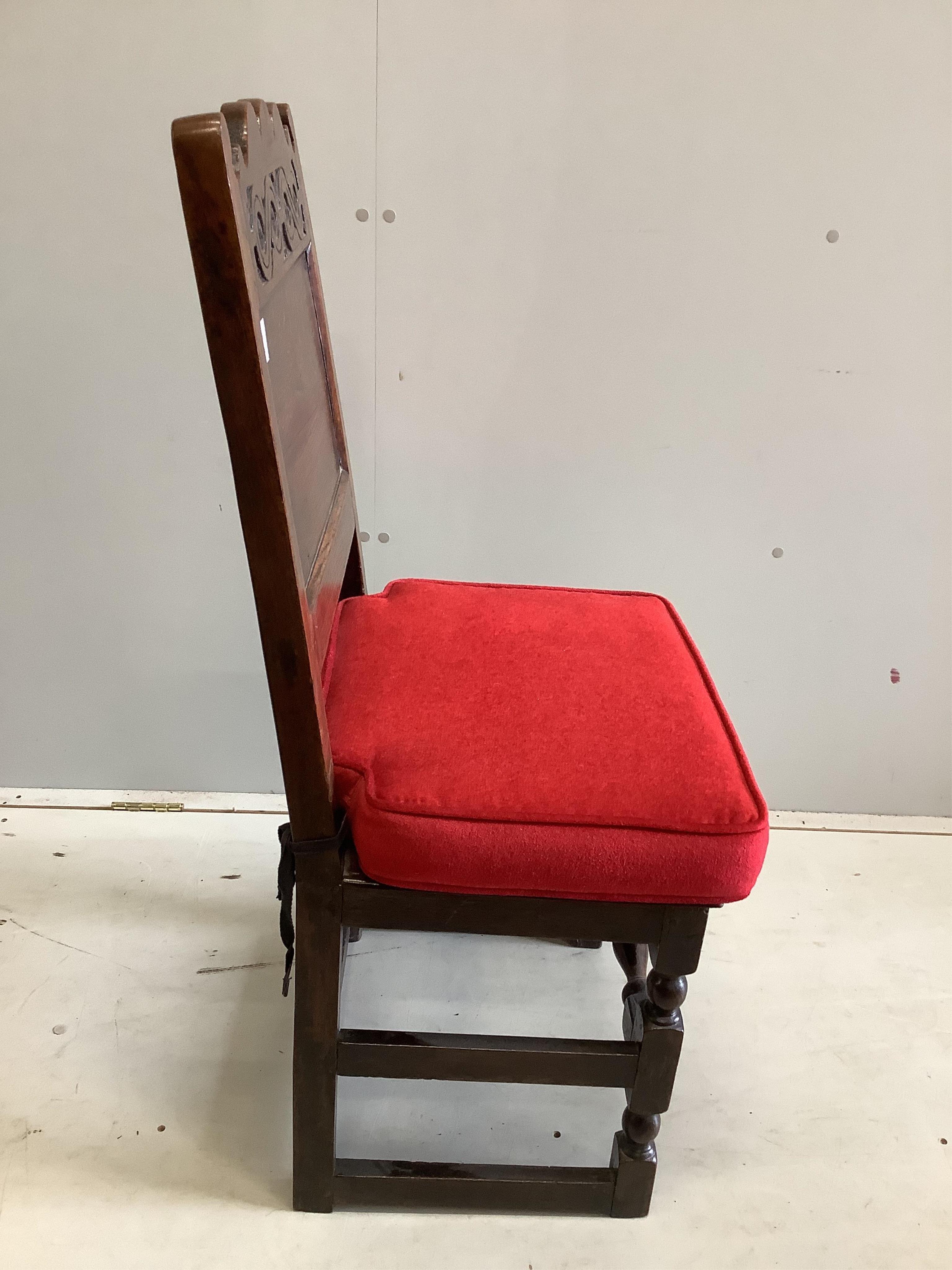 A late 17th century oak back chair, width 45cm, depth 42cm, height 103cm. Condition - fair